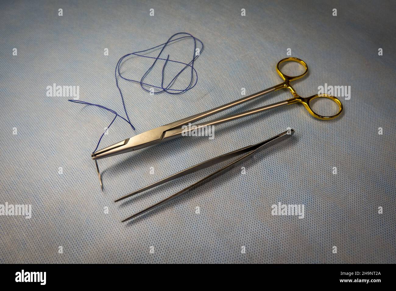 Needle holder hi-res stock photography and images - Alamy