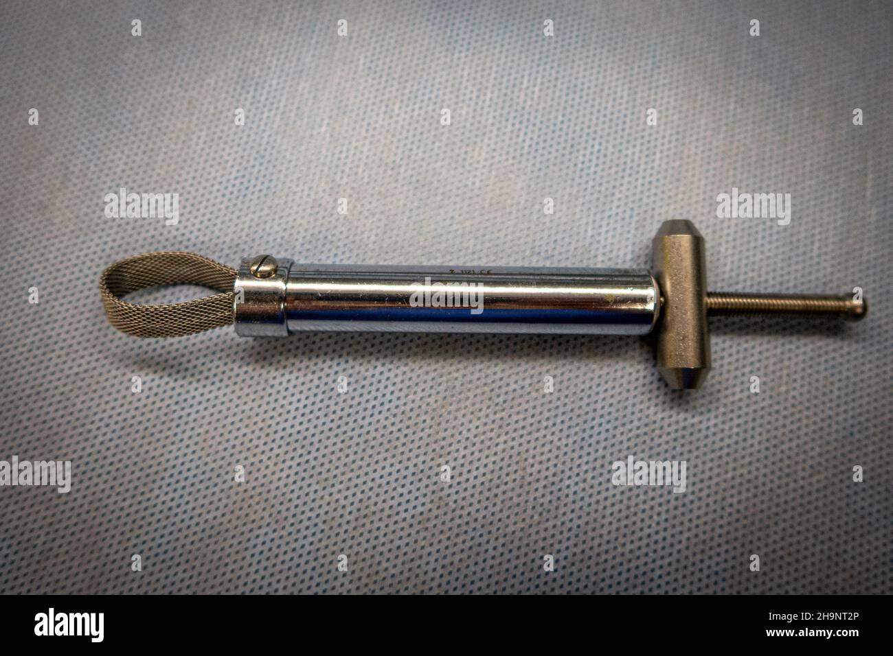 with a surgical finger tourniquet, the blood supply in the finger is