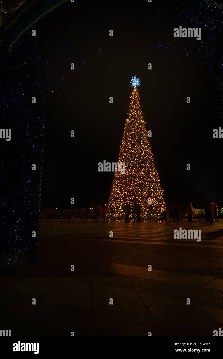 Yalta Crimea December 28, 2019. New Year decorations of the city. Bright festive lights sparkle in the night city. Blurry background without people. T Stock Photo