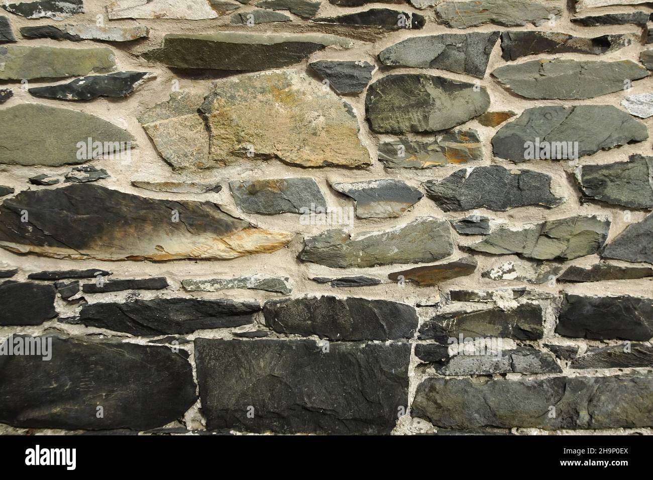 Old wall made of stones, textured background Stock Photo