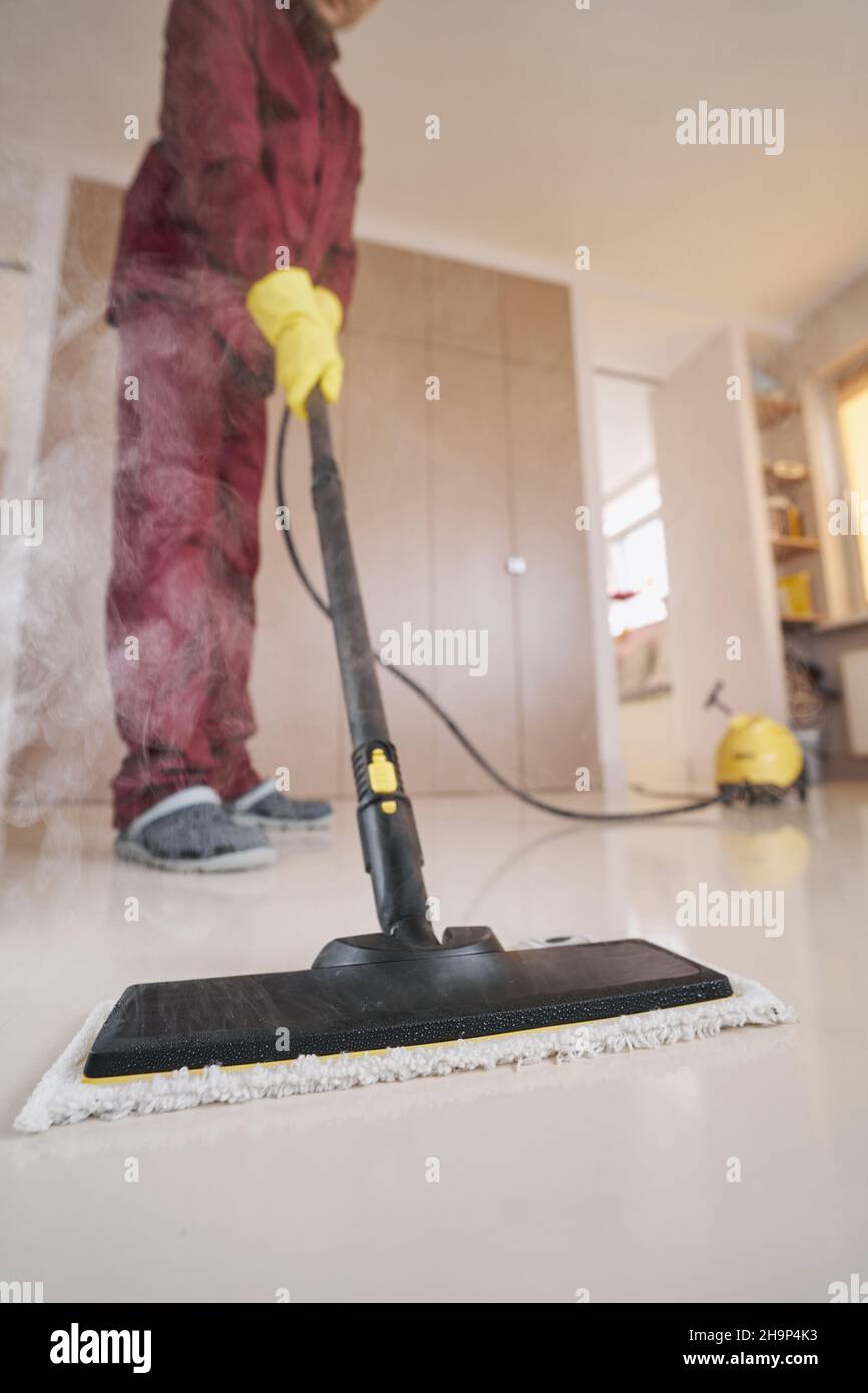 Person using steam cleaner hi-res stock photography and images - Alamy