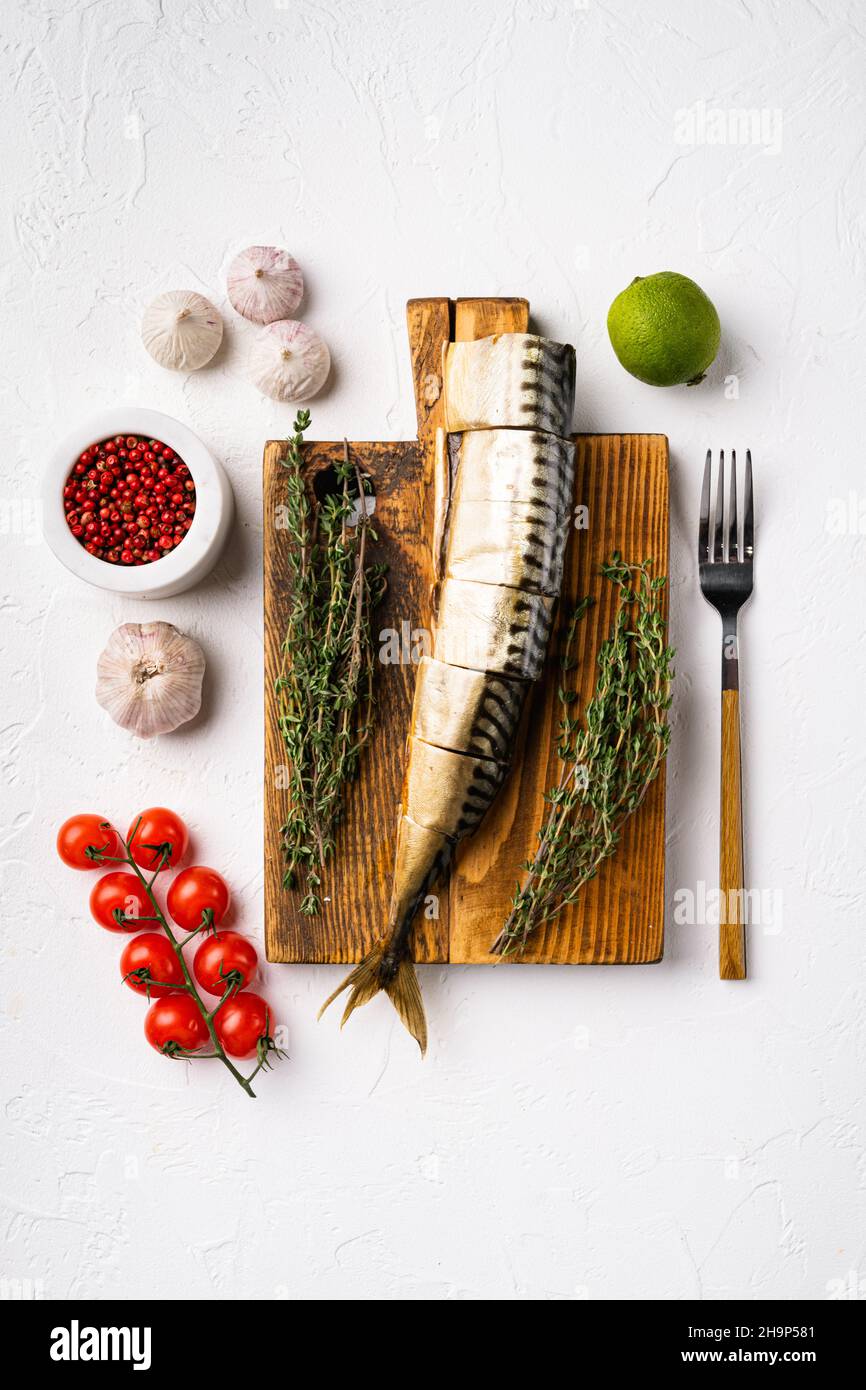 Smoked fish set, on white stone table background, top view flat lay ...