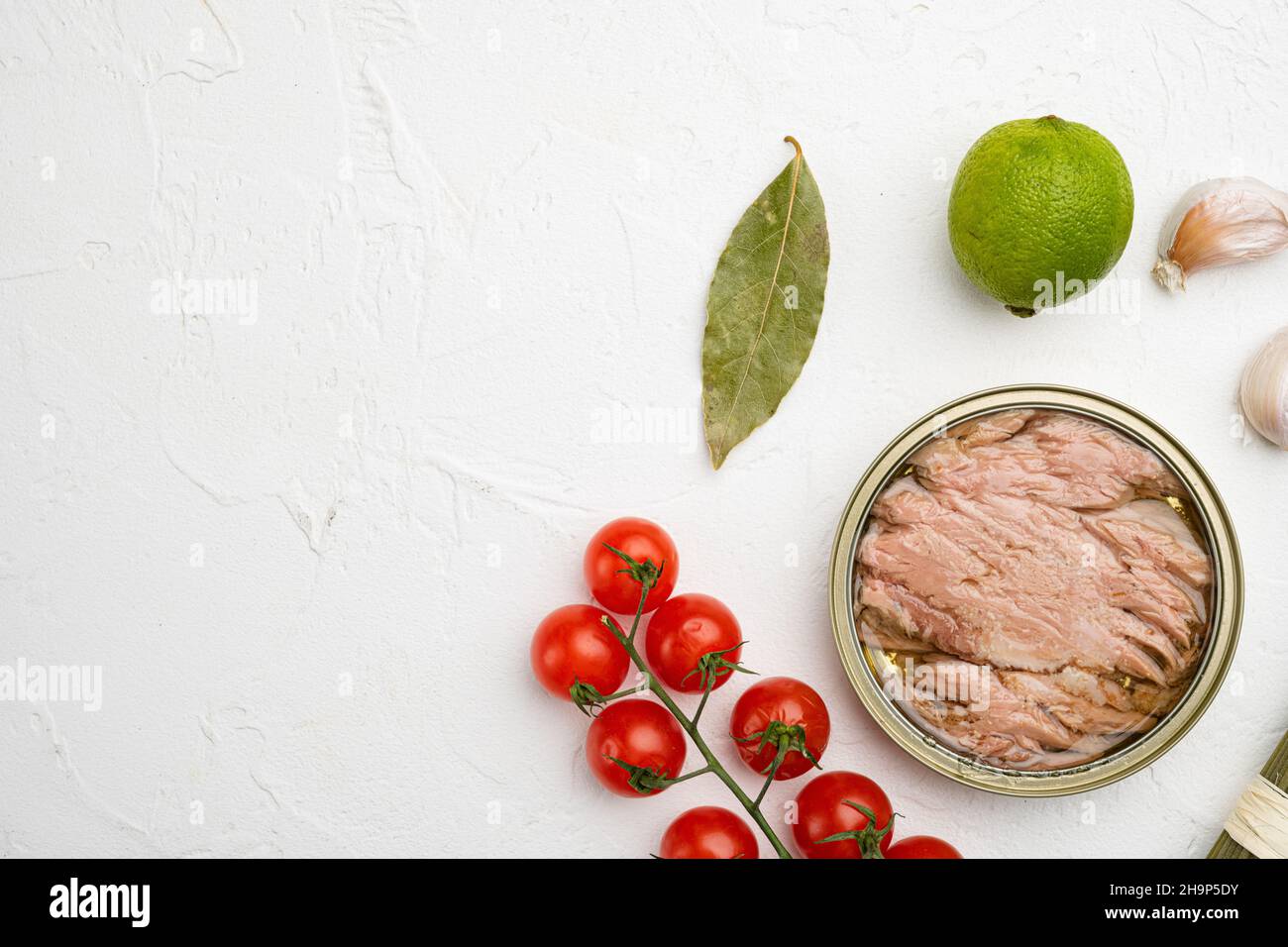 Canned tuna fish set, on white stone table background, top view flat ...