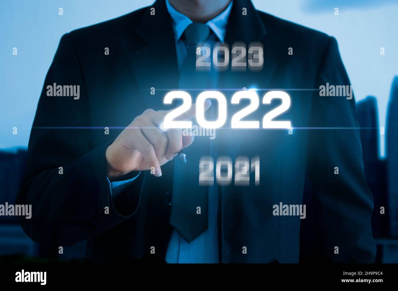 hand touching screen digital virtual futuristic interface 2022 New year Stock Photo