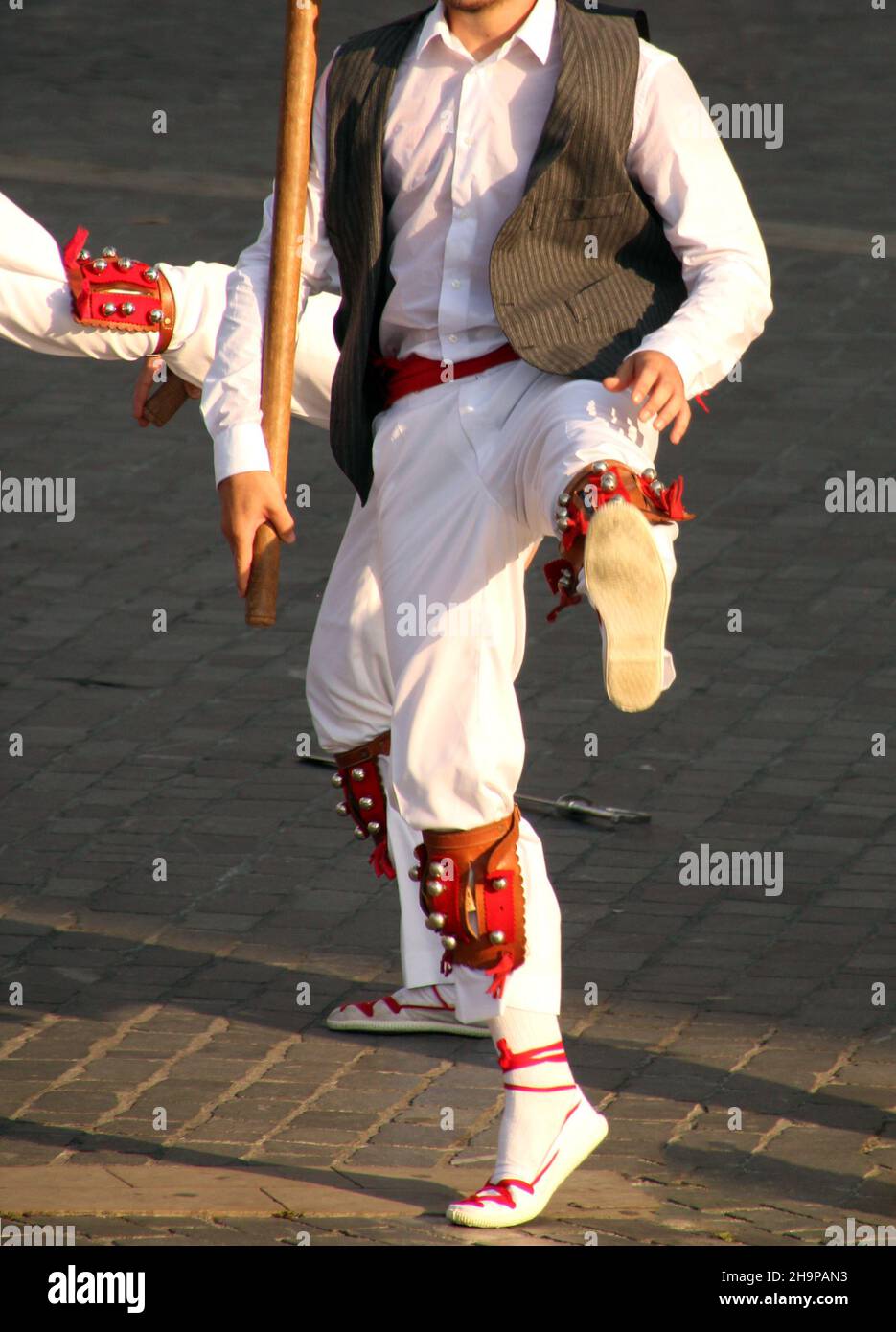 Person traditional clothing doing a folk dance in Basque Country Stock Photo