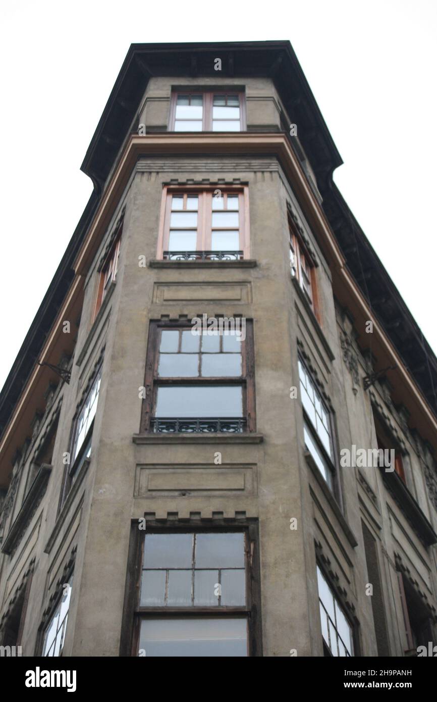 Vertical low angle shot of an angled residential building in Bilbao ...