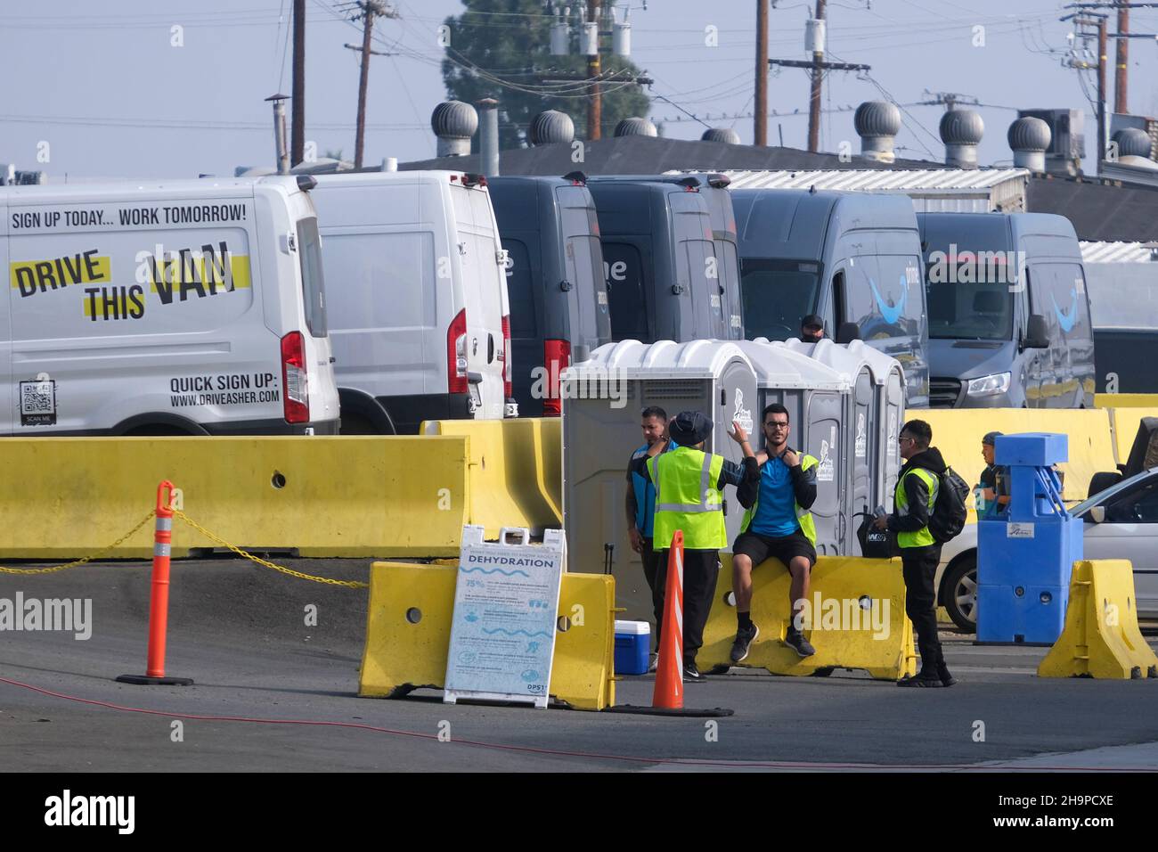 Los Angeles, California, USA. 7th Dec, 2021. Amazon drivers and their