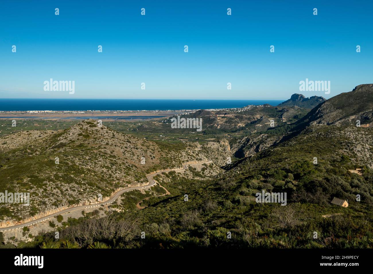 Winding mountain road between Pego village and Vall d'Ebo, Marina Alta, Costa Blanca, Alicante Province, Spain Stock Photo