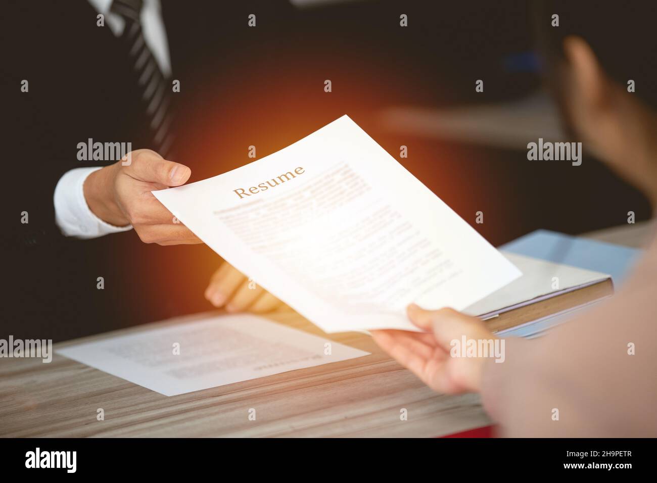 Business people Job Apply giving Resume CV document to HR for recruit new employee Stock Photo