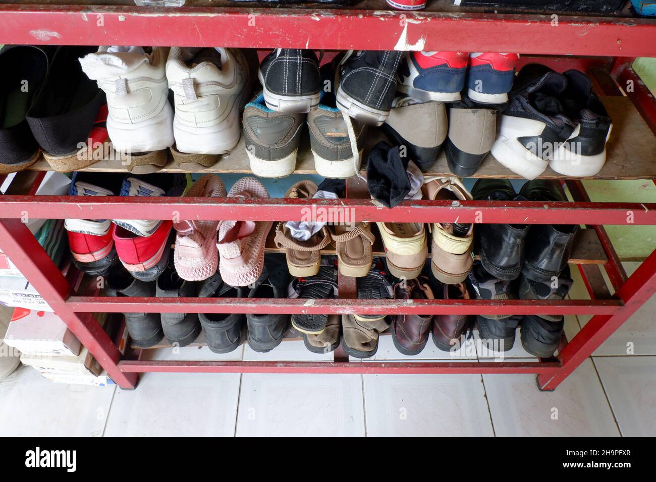 Shoe rack home hi-res stock photography and images - Alamy