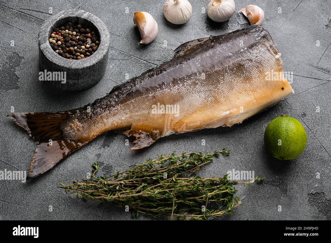 Smoked whole trout, on gray stone table background Stock Photo - Alamy