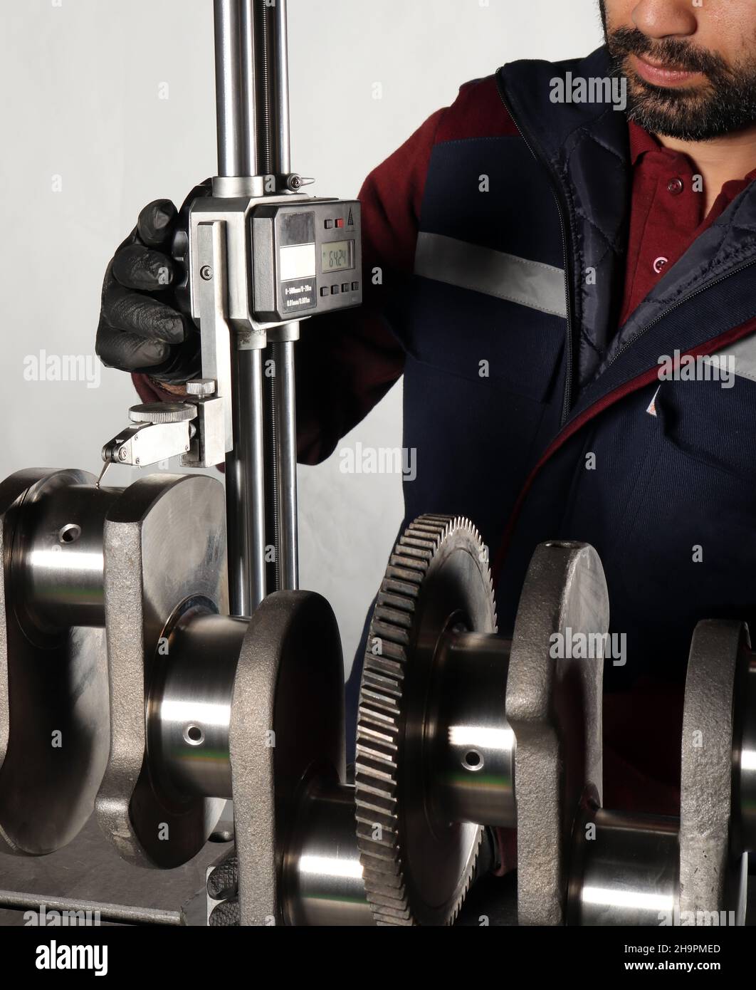 Precise measurement on the crankshaft Stock Photo Alamy