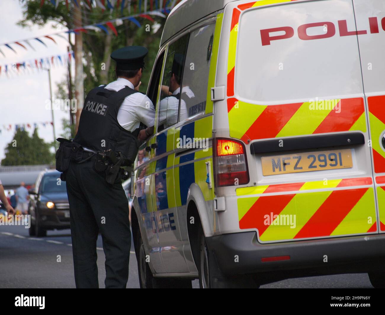 Police prepare for the 2017 12th July celebrations in Hillsborough, Northern Ireland in a 2013 model VW Transporter Stock Photo