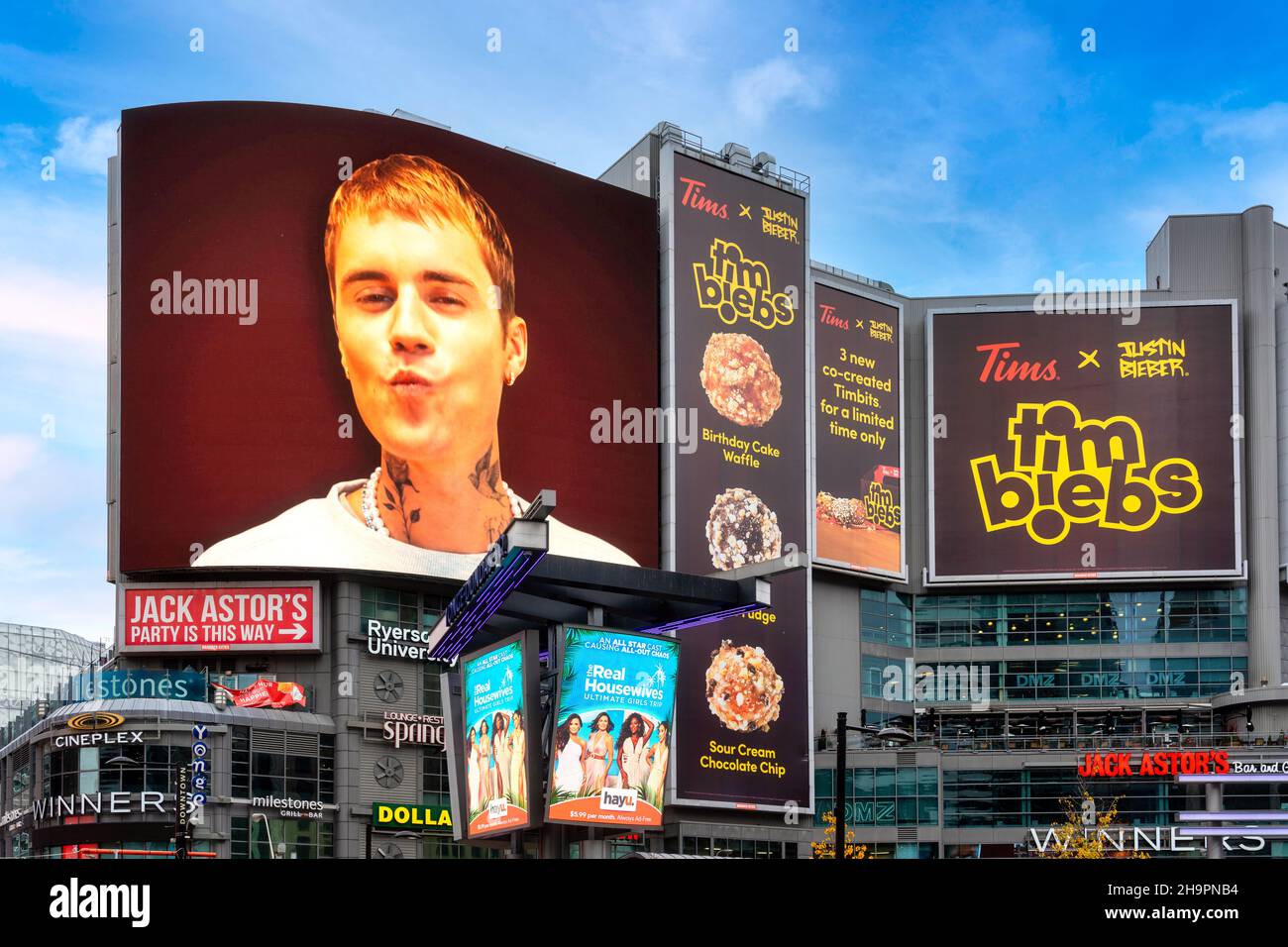 Tim Hortons business chain advertise its new product Timbiebs at Dundas Square. The food product uses the image of Justin BieberDec. 8, 2021 Stock Photo