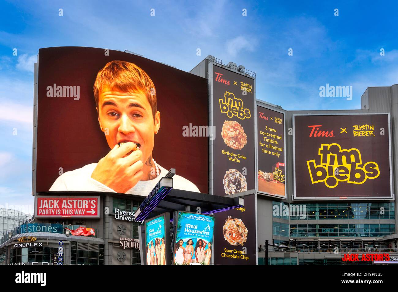 Tim Hortons business chain advertise its new product Timbiebs at Dundas Square. The food product uses the image of Justin BieberDec. 8, 2021 Stock Photo
