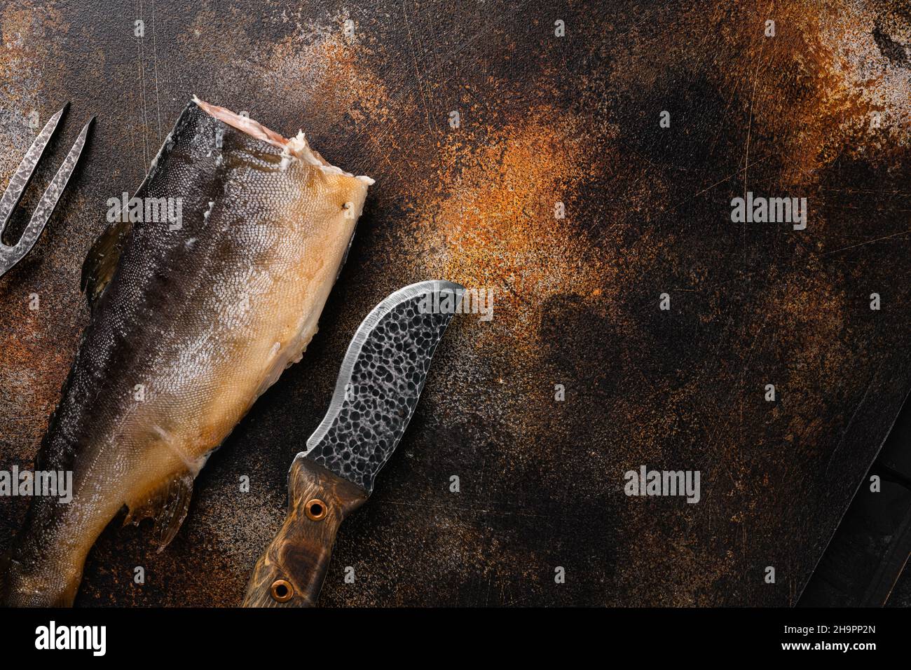 Fresh smoked salmon, on old dark rustic table background, top view flat ...