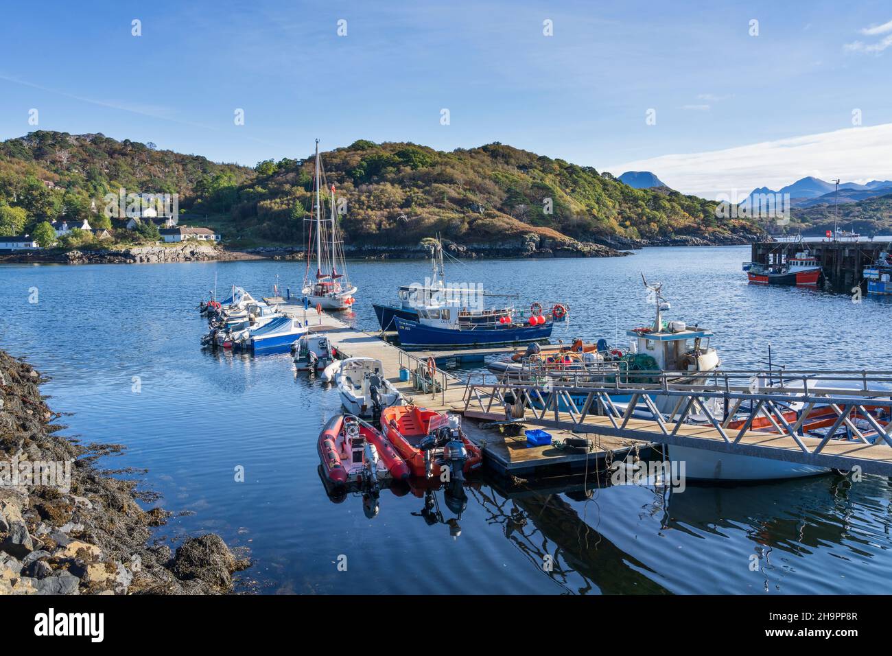Pleasure boats moored at Gairloch Harbour, Wester Ross, Scotland, UK Stock Photo