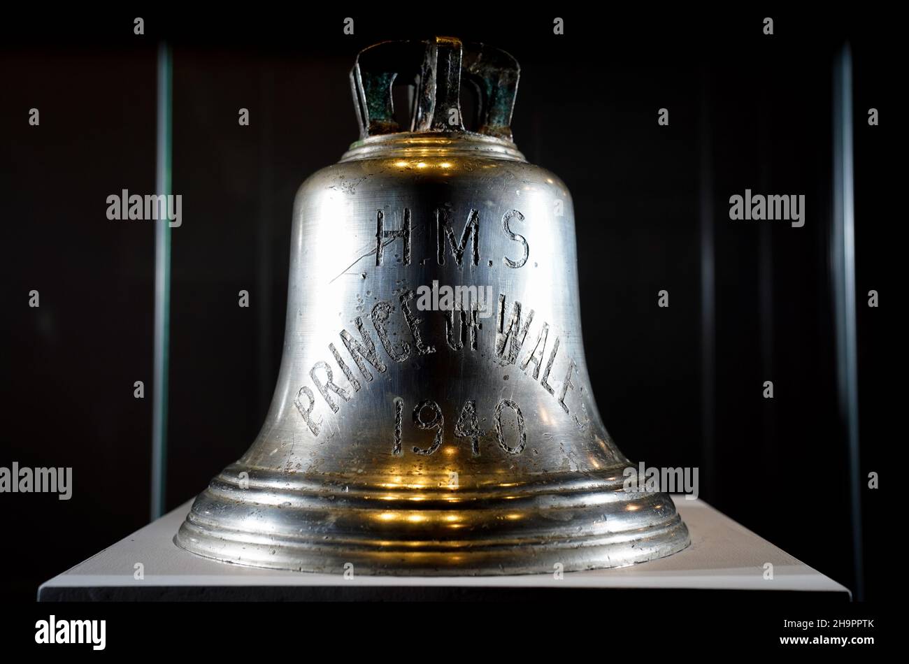 The ship's bell from HMS Prince of Wales which was sunk along with HMS Repulse after a Japanese air attack on December 10 1941. 842 men lost their lives in what is one of the worst disasters in British naval history. Picture date: Wednesday December 8, 2021. Stock Photo
