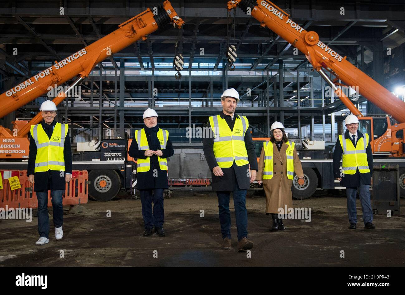 (from left) Director General of the BBC Tim Davie, Minister for Constitution, External Affairs and Culture Angus Robertson CEO of BBC Studio Works Andrew Moultrie, Leader of Glasgow City Council Susan Aitken and CEO of Creative Scotland Iain Munro during a tour of the construction site at Kelvin Hall where the BBC has been unveiled as the Tenant Operator for the new £11.9 million Kelvin Hall Film & Broadcast Studio Hub in Glasgow. Picture date: Wednesday December 8, 2021. Stock Photo