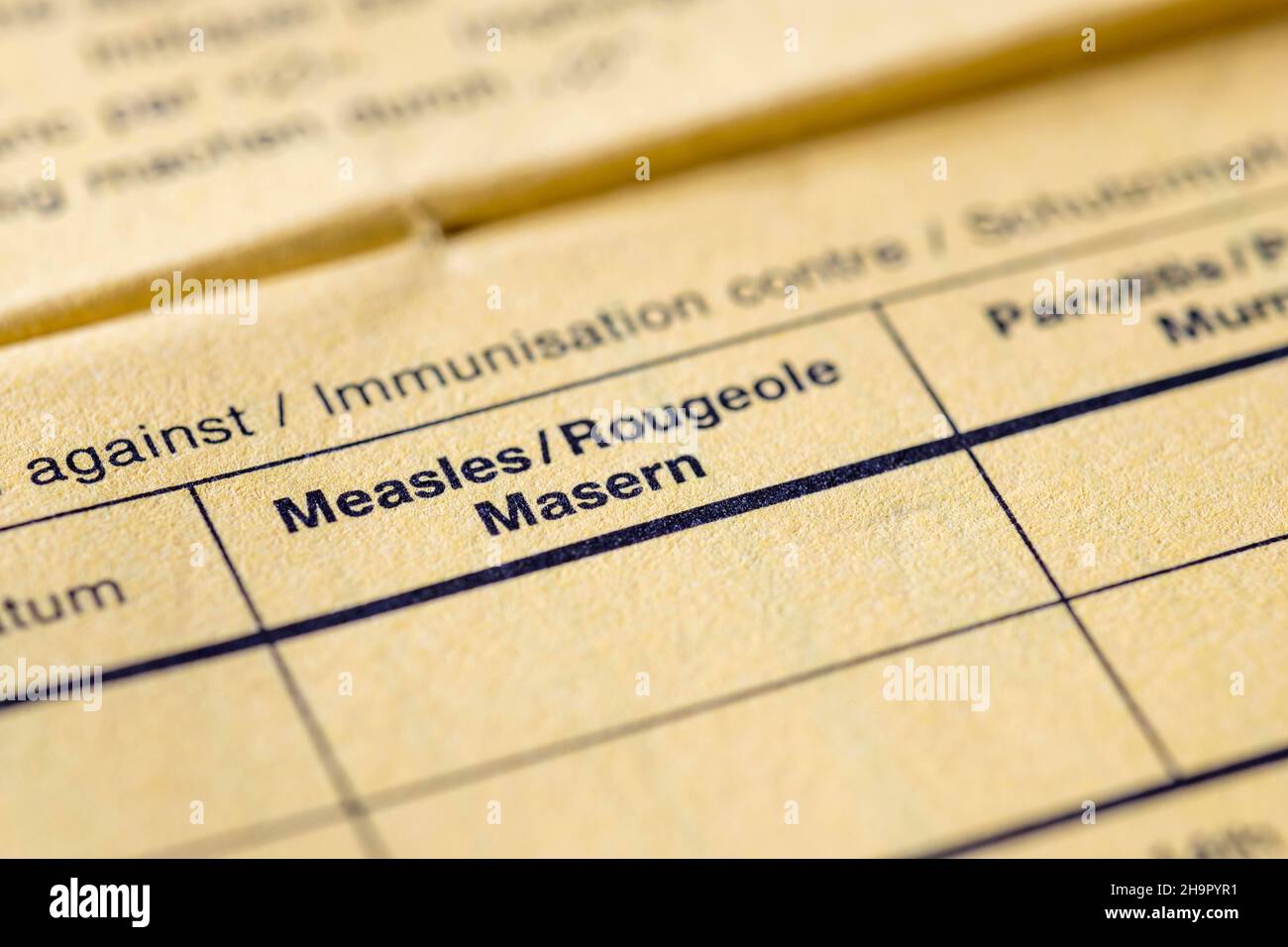 Vaccination certificate, vaccination book, measles Stock Photo