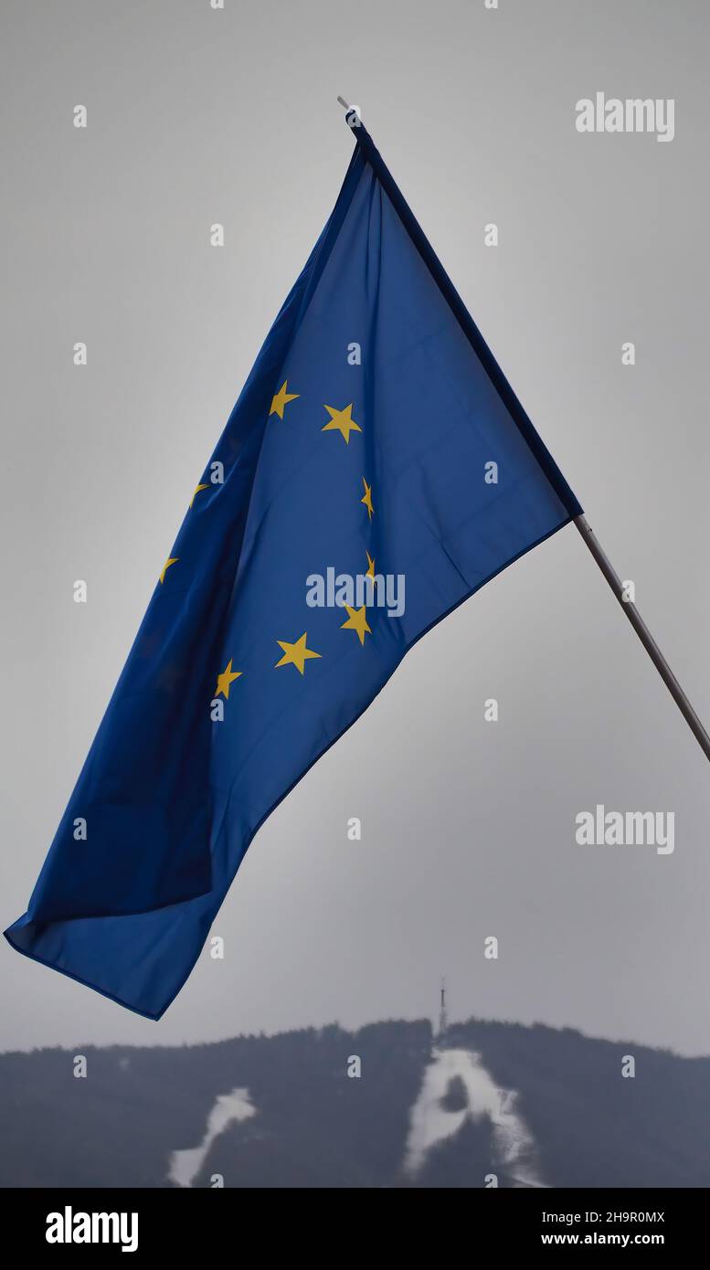 Flag of the European Union on the flagpole against a sky Stock Photo ...