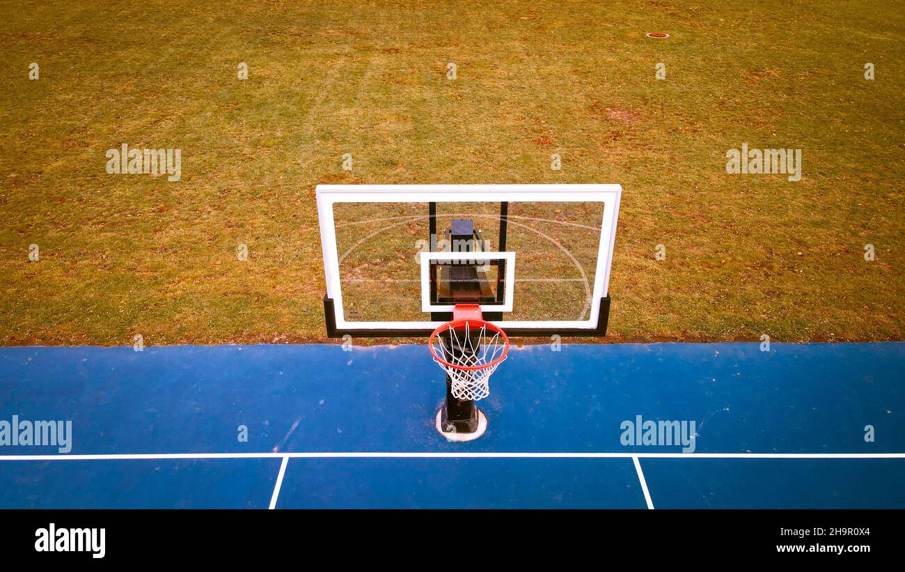 Vibrant Blue Basketball Hoop from Front Stock Photo