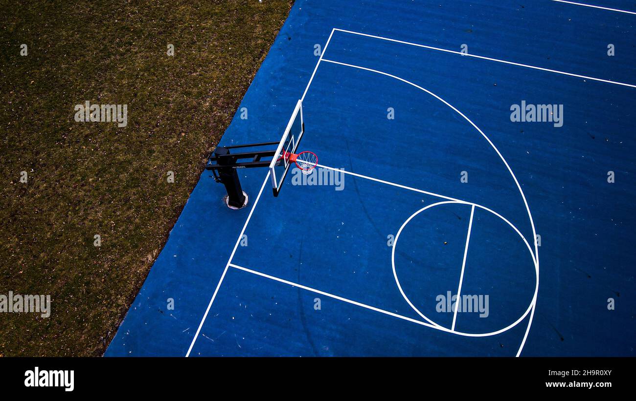 Vibrant Blue Basketball Hoop Stock Photo