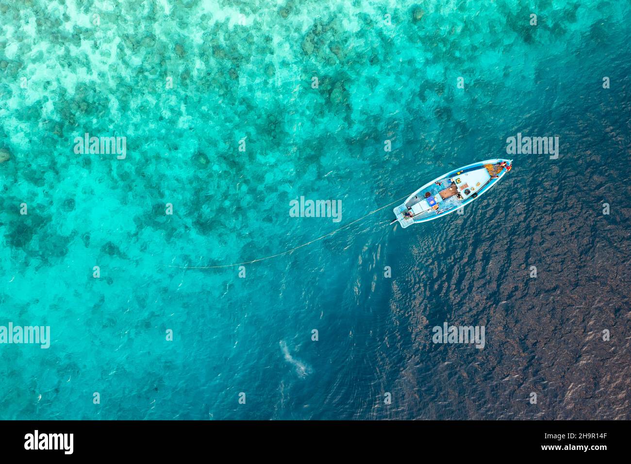 Aerial view, small fishing boat on a reef, Laviyani Atoll, Maldives, Indian Ocean Stock Photo