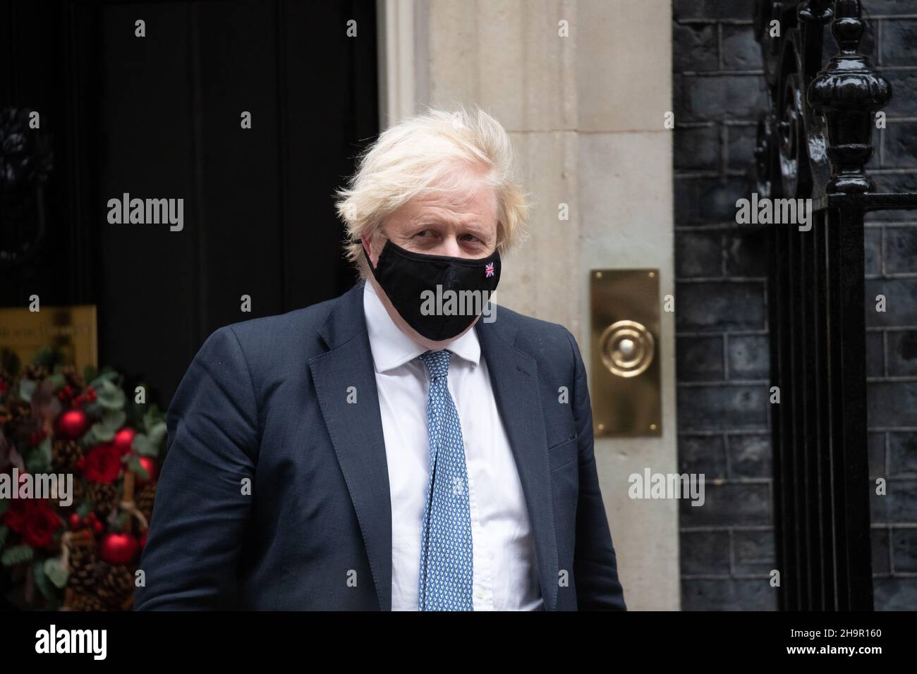 LONDON, UK 8TH DECEMBER 2021. Prime Minister Boris Johnson leaves Number 10 Downing Street For PMQs at The House of Commons. Stock Photo