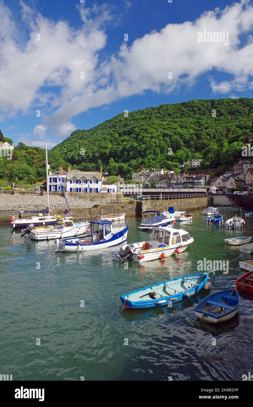 Small boats in natural harbour, green landscape, Lyndmouth, Devon, Great Britain Stock Photo