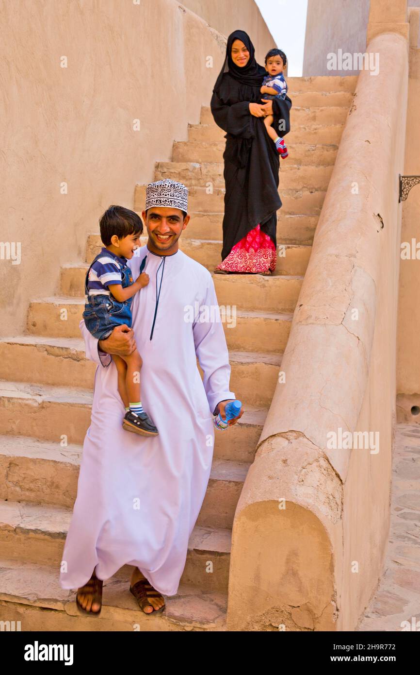 Omani Visiting Family, Nizwa Fort, Oasis City of Nizwa, Nizwa, Oman Stock Photo