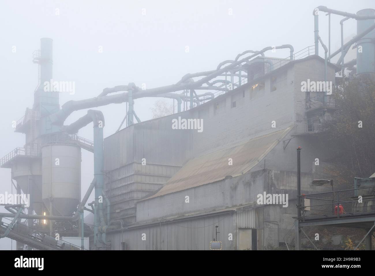Holcim Gravel and Grit Quarry in fog, Plettenberg, Sauerland, North  Rhine-Westphalia, Germany Stock Photo - Alamy
