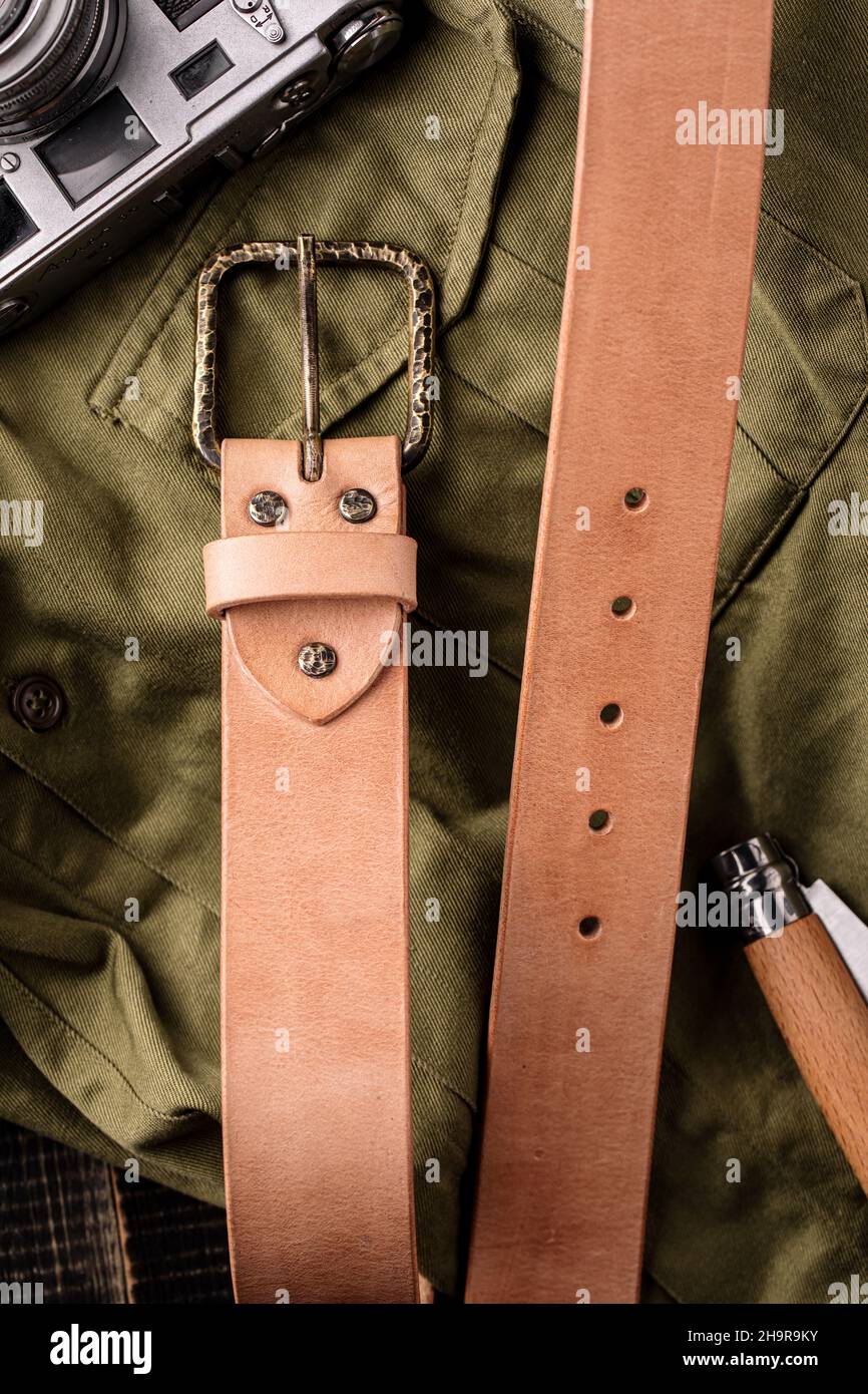 Handcrafted light brown leather strap belt Stock Photo Alamy