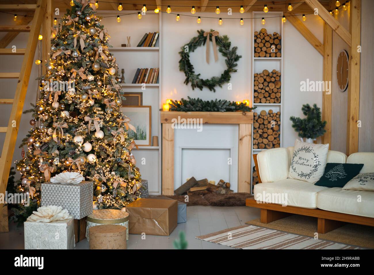 Stylish living room interior with Christmas tree Stock Photo - Alamy