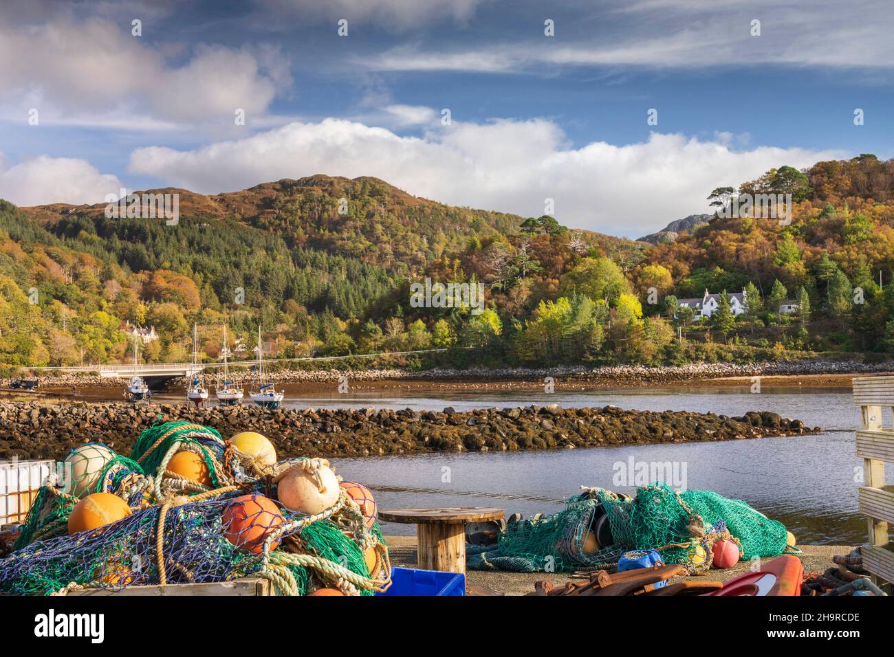 Fishing nets, buoys and ropes on the harbour side at Gairloch in autumn, Wester Ross, North-West Highlands, Scotland. Stock Photo