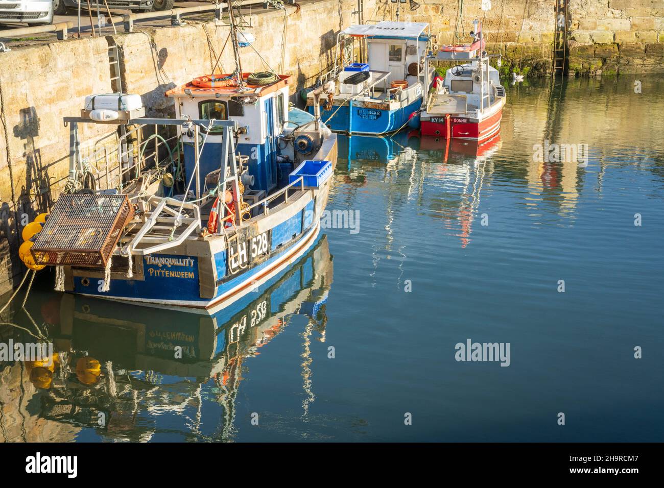 Fishing boats moored in the harbour at Pittenweem, Nuke of Fife, Scotland. Stock Photo