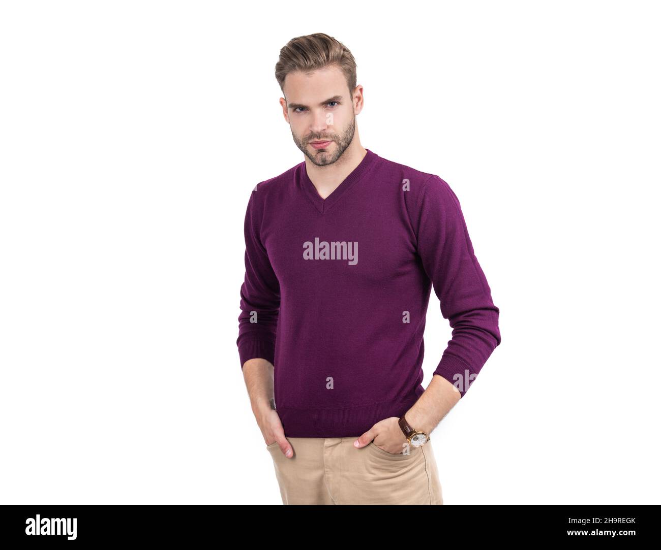 Handsome guy wear violet pullover with casual pants isolated on white, attractive Stock Photo