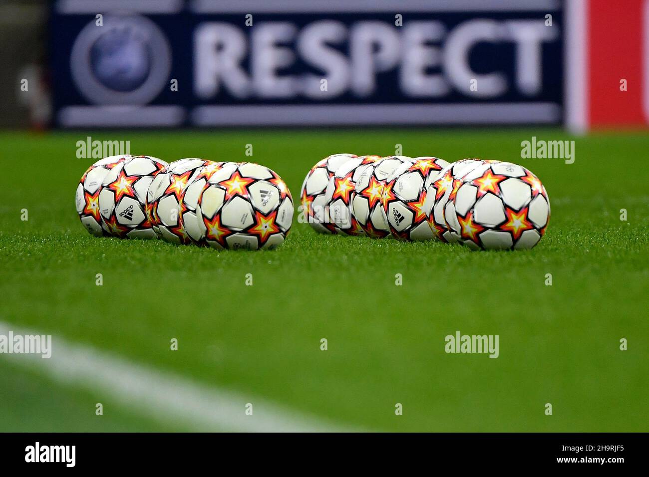 Milano, Italy. 07th Dec, 2021. Two rows of official champions league balls  Adidas are seen in front of a sign saying respect during the Uefa Champions  League Group B football match between