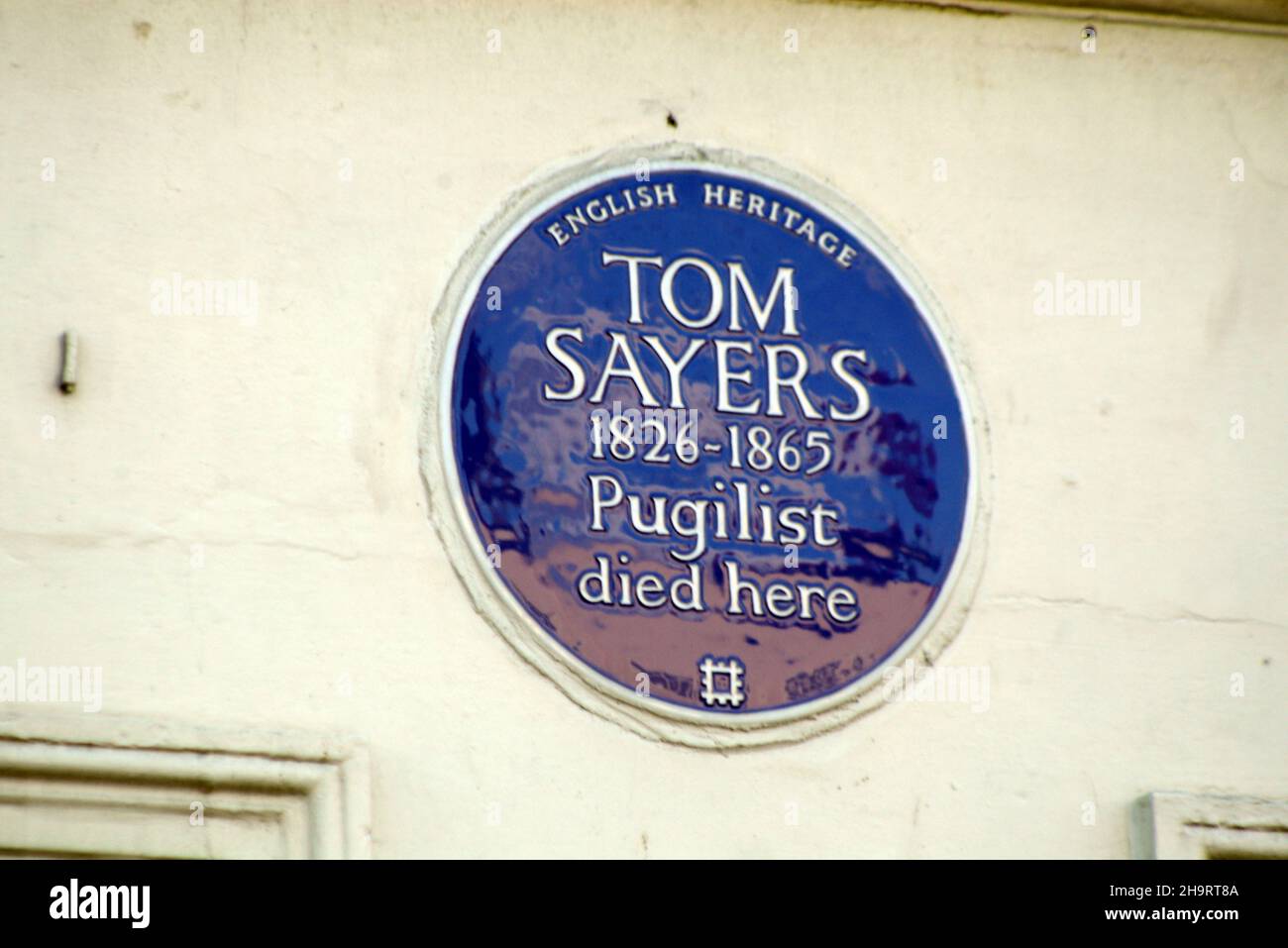 Blue plaque honouring the pugilist Tom Sayers, London, United Kingdom. Stock Photo