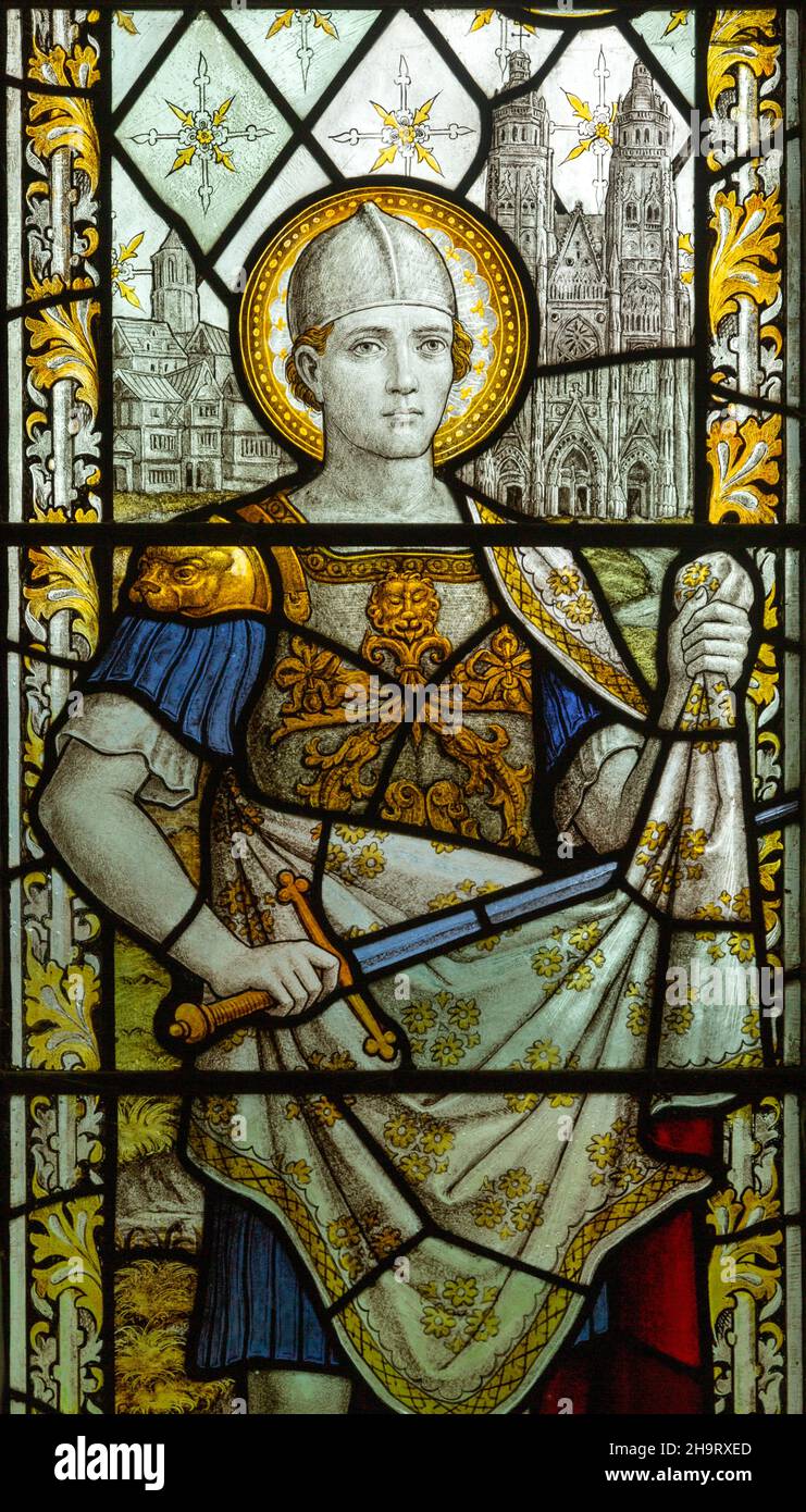 Stained glass window of Saint Martin cutting his cloak, Edwardstone church, Suffolk, England, UK c 1915 by Burlison & Grylls Stock Photo