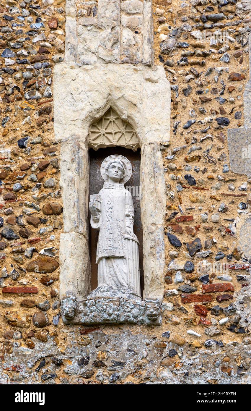 Statue of Saint Lawrence in wall niche, Great Waldingfield church, Suffolk, England, UK Stock Photo
