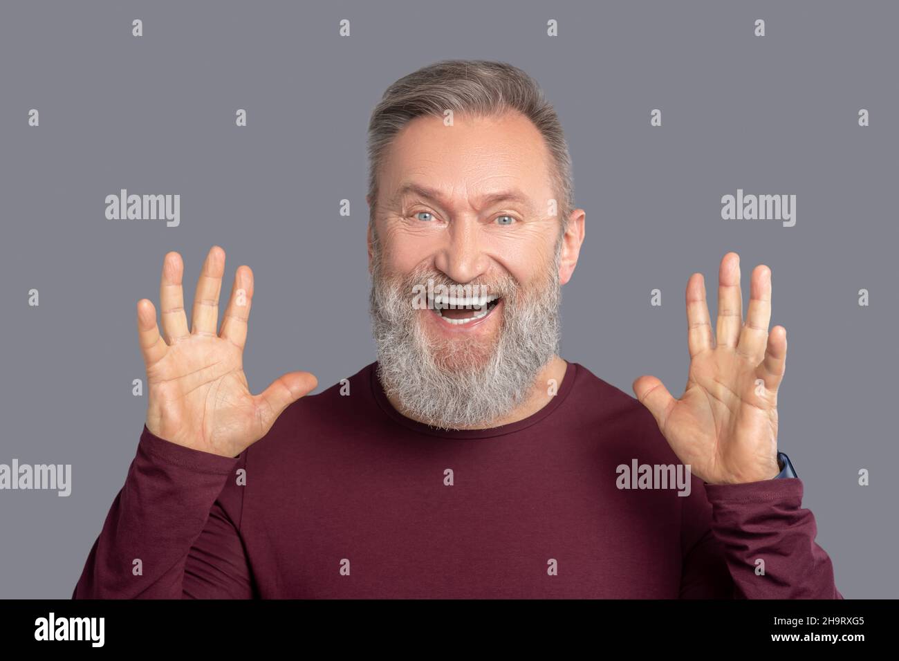 Excited mature male person hi-res stock photography and images - Alamy