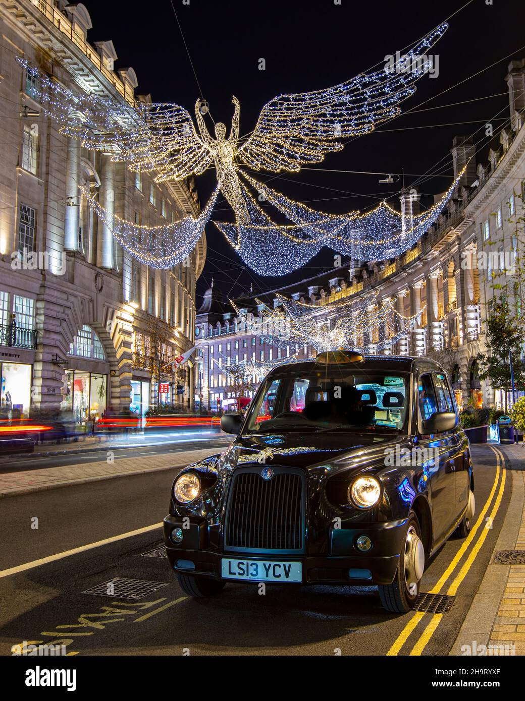 London, UK December 2nd 2021 Traditional taxi cab parked on Regent