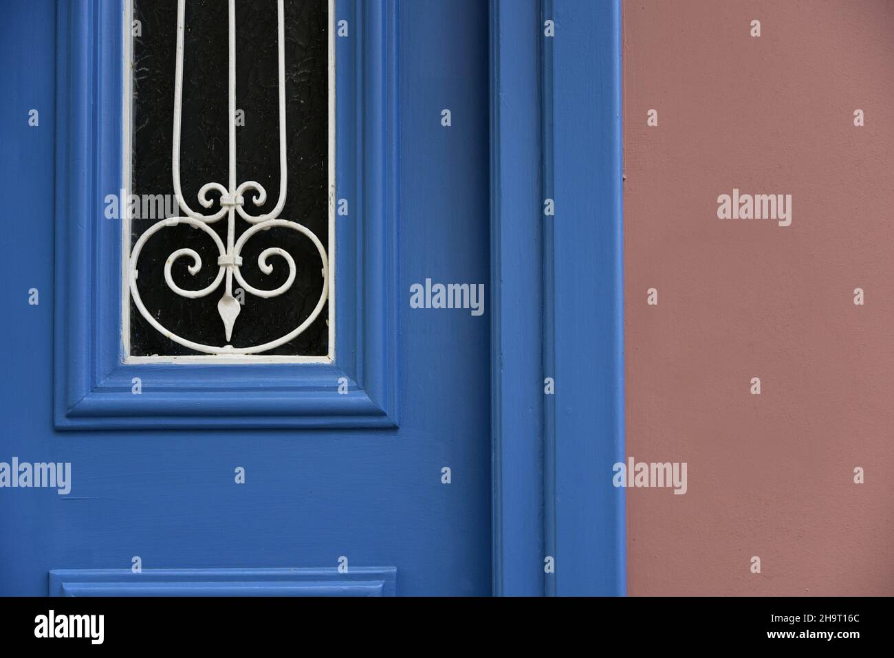 Old Neoclassical house blue wooden door with white handcrafted iron ...