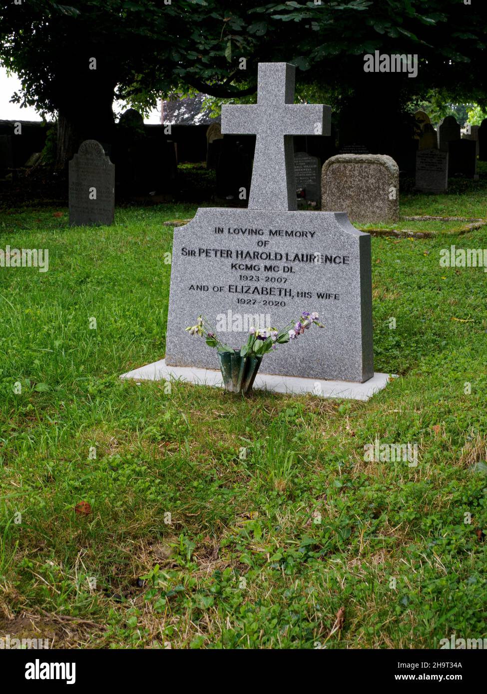 The grave of Sir Peter Harold Laurence, Military hero, diplomat and author, Beaford, Devon, UK Stock Photo