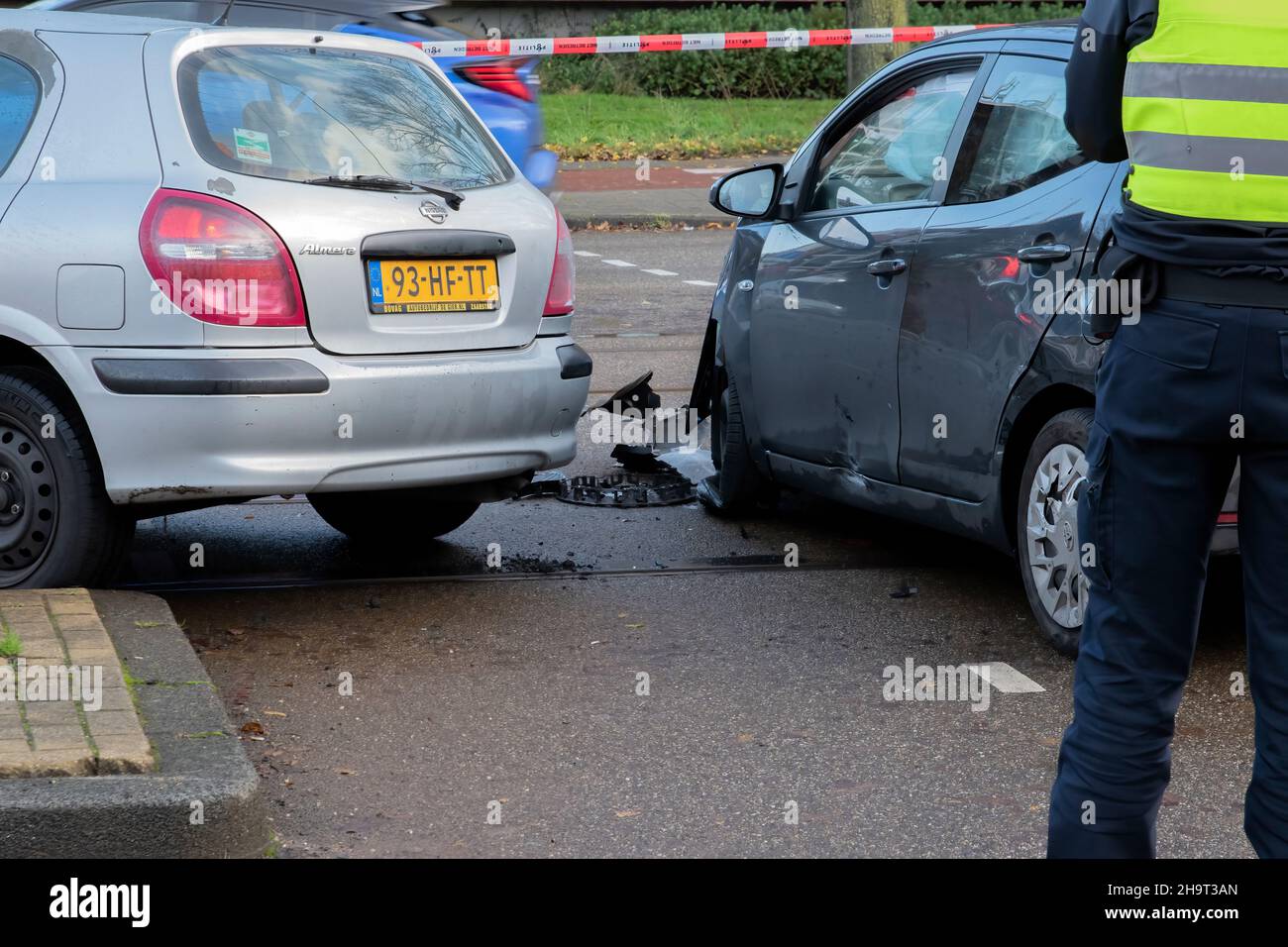 Police Man Looking At The A Car Accident At Amsterdam The Netherlands 7-12-2021 Stock Photo