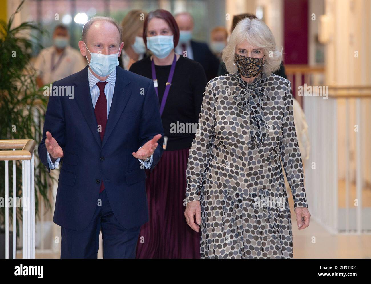 The Duchess of Cornwall with Chairman Adrian Williams as she visits the Royal Trinity Hospice in London, to switch on the Christmas lights and celebrate the hospice's 130th anniversary. Picture date: Wednesday December 8, 2021. Stock Photo
