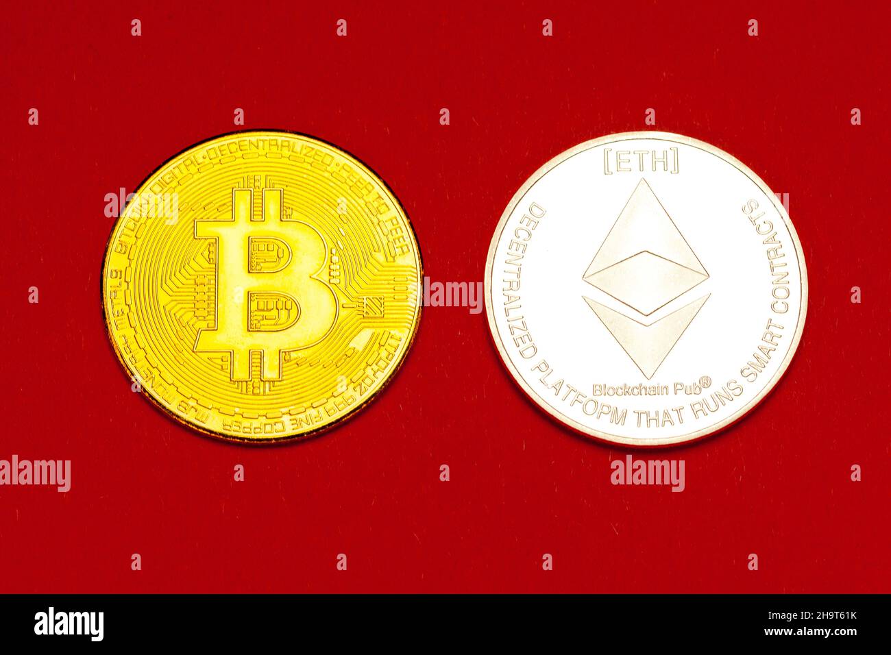 Bitcoin and Ethereum crytocurrencey coins. Stock Photo