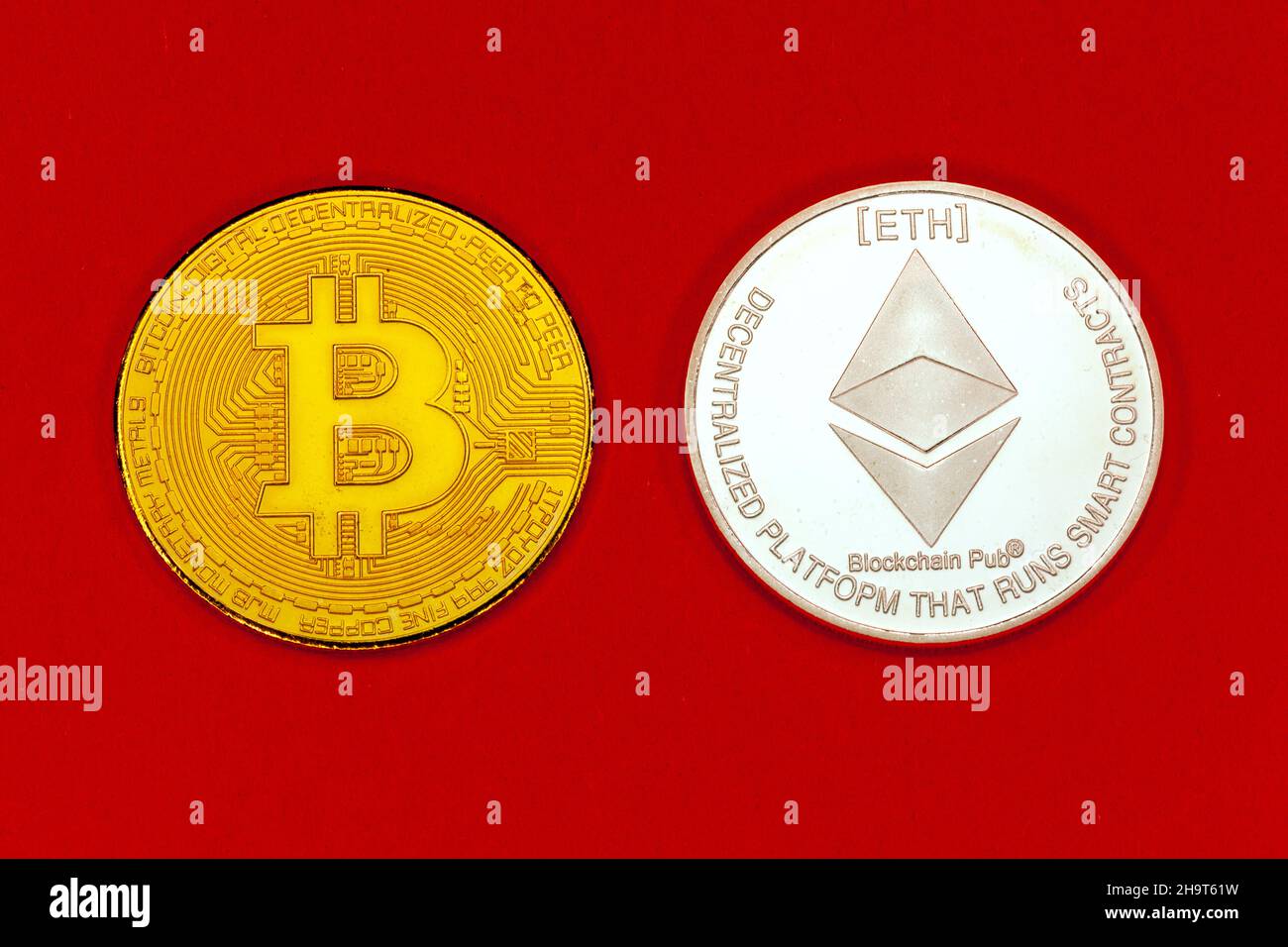 Bitcoin and Ethereum crytocurrencey coins. Stock Photo