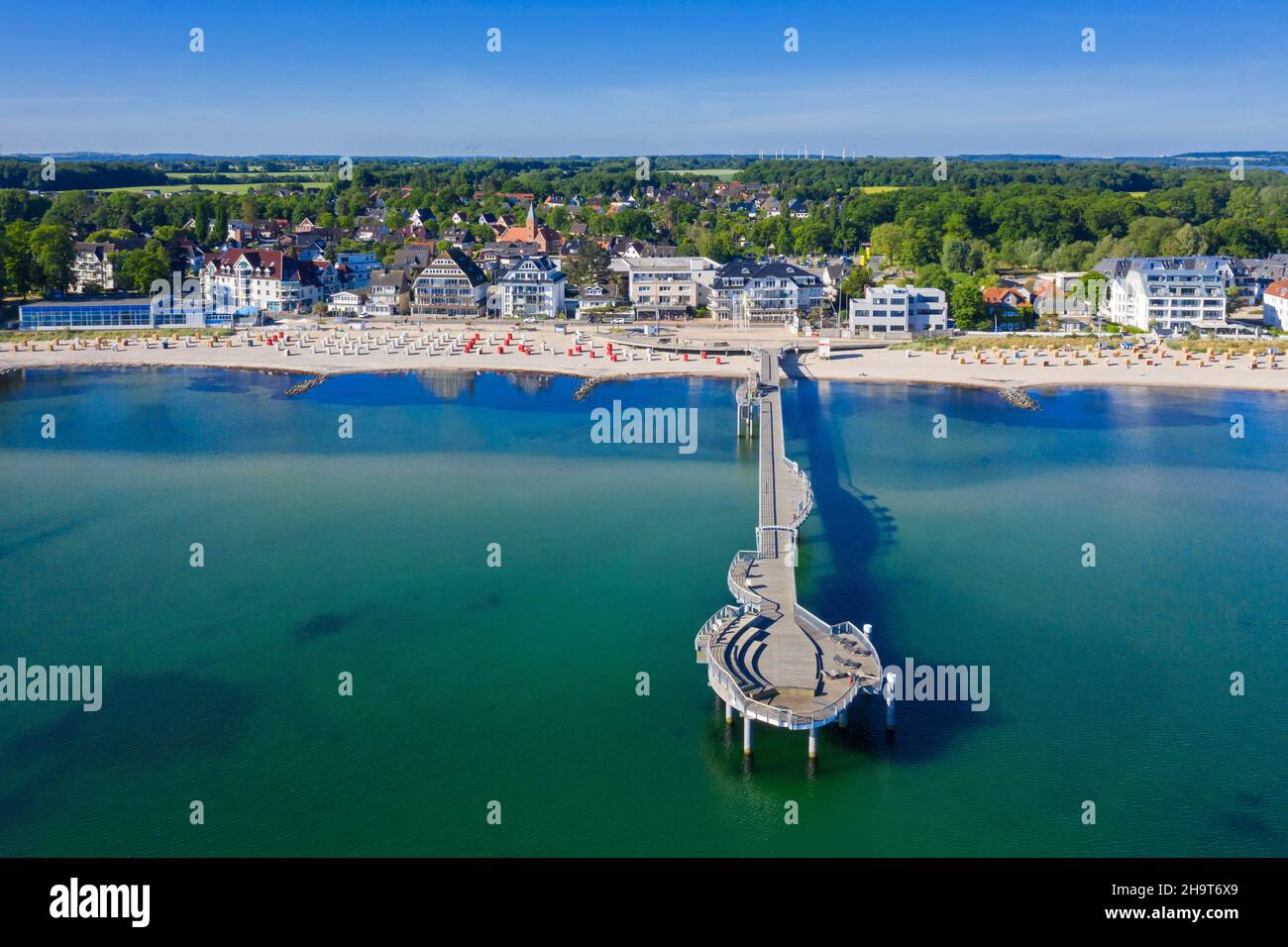 Aerial view over wooden pleasure pier and hotels at seaside resort Niendorf along the Baltic Sea, Timmendorfer Strand, Schleswig-Holstein, Germany Stock Photo